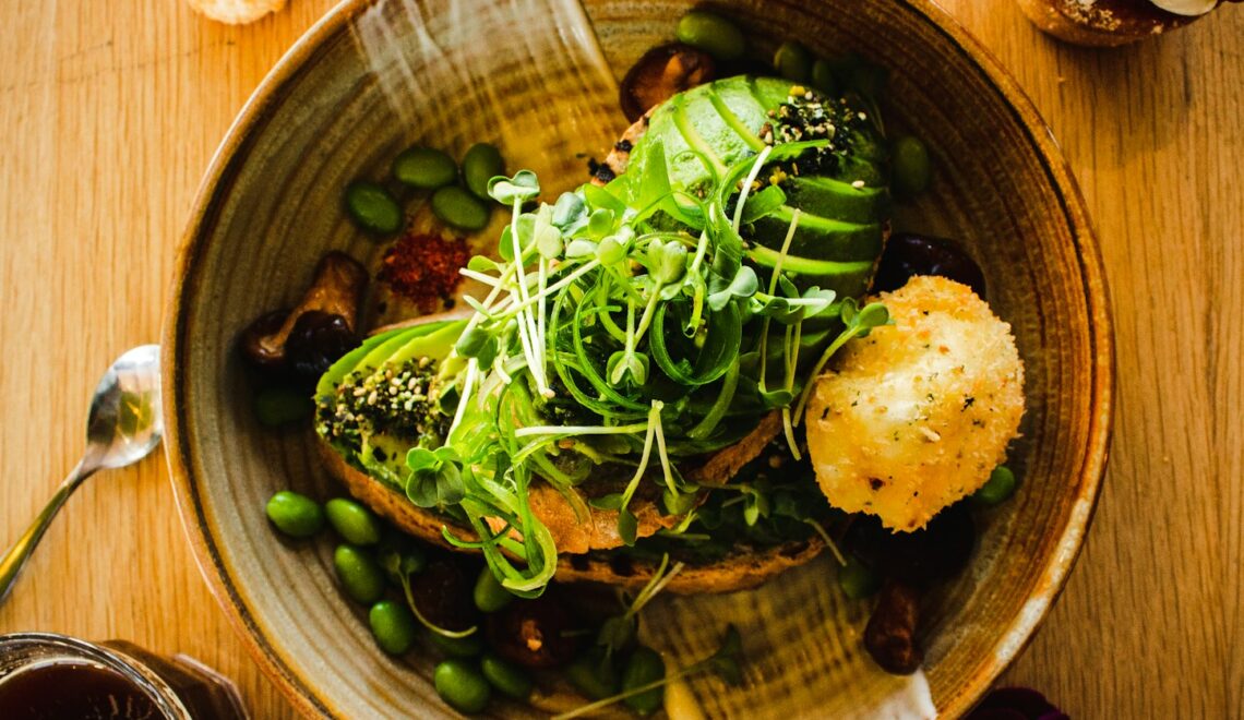 green beans and vegetable salad on brown bowl