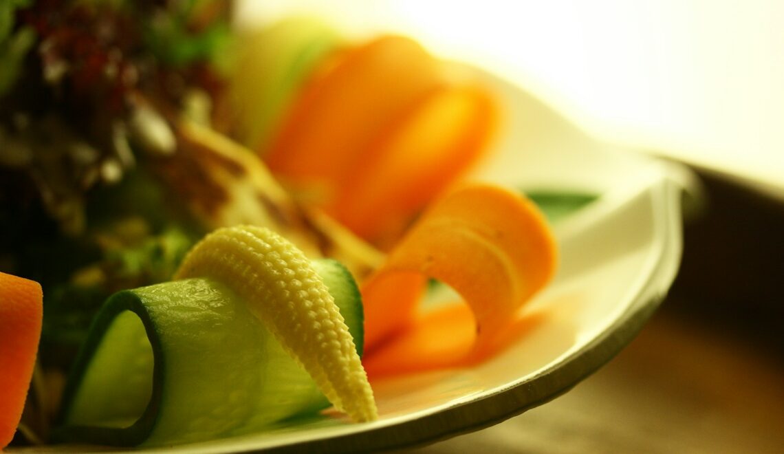 sliced cucumber on white ceramic plate