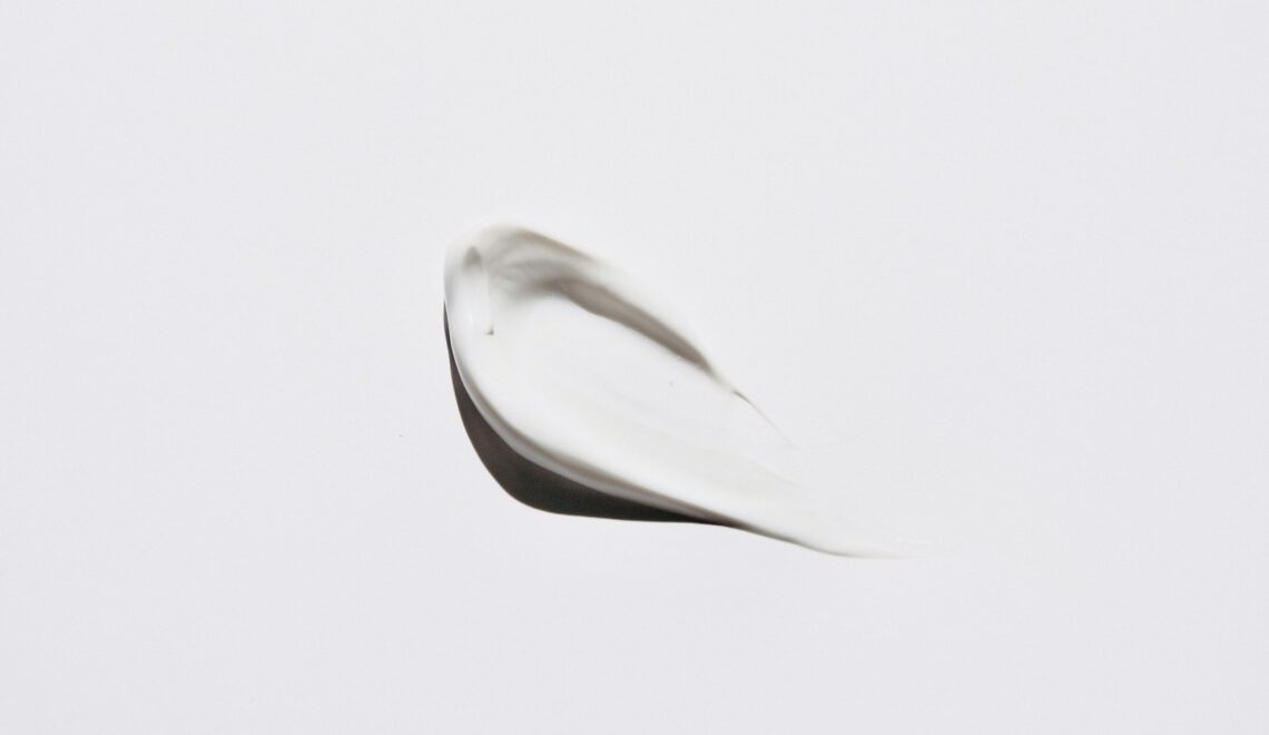 stainless steel spoon on white surface