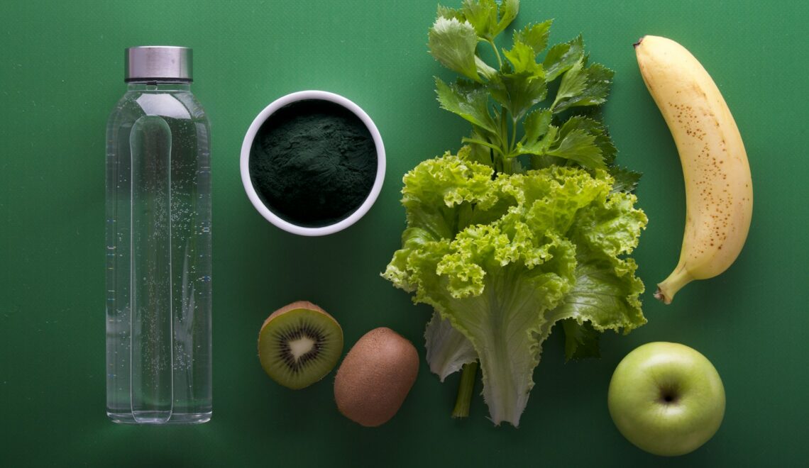 assorted fruits and vegetables on green surface